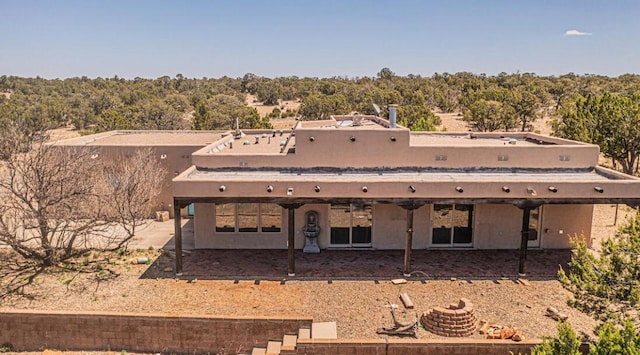 view of front of house with a patio area