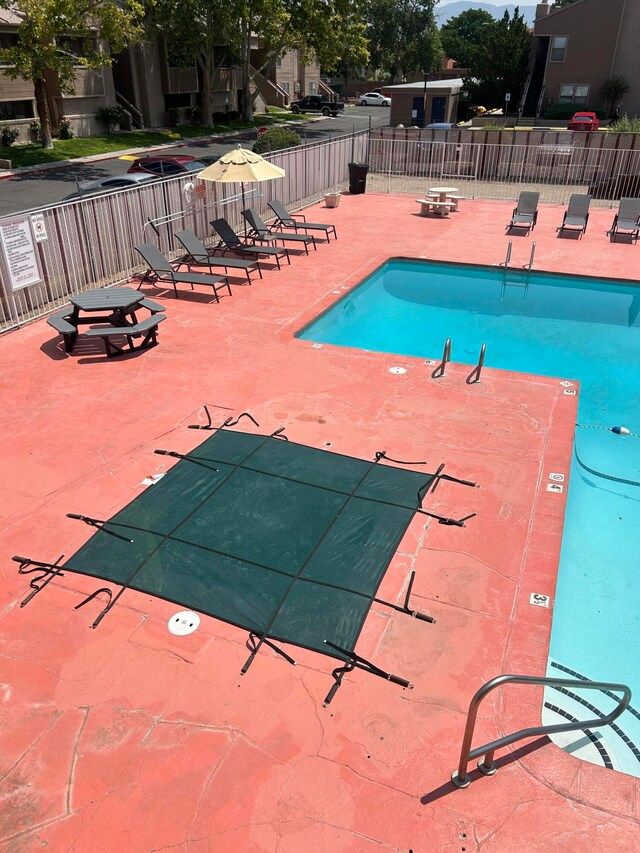 view of pool featuring a patio