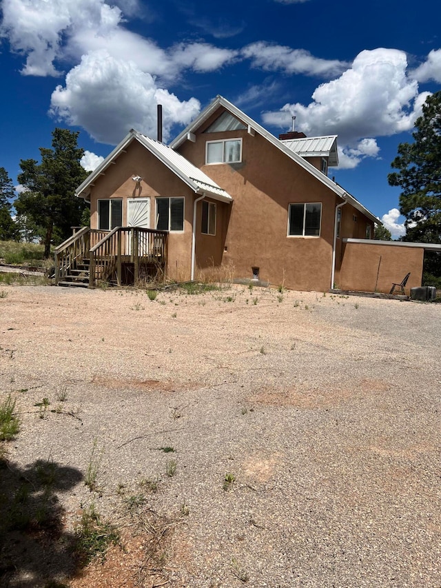 view of front of house with a deck