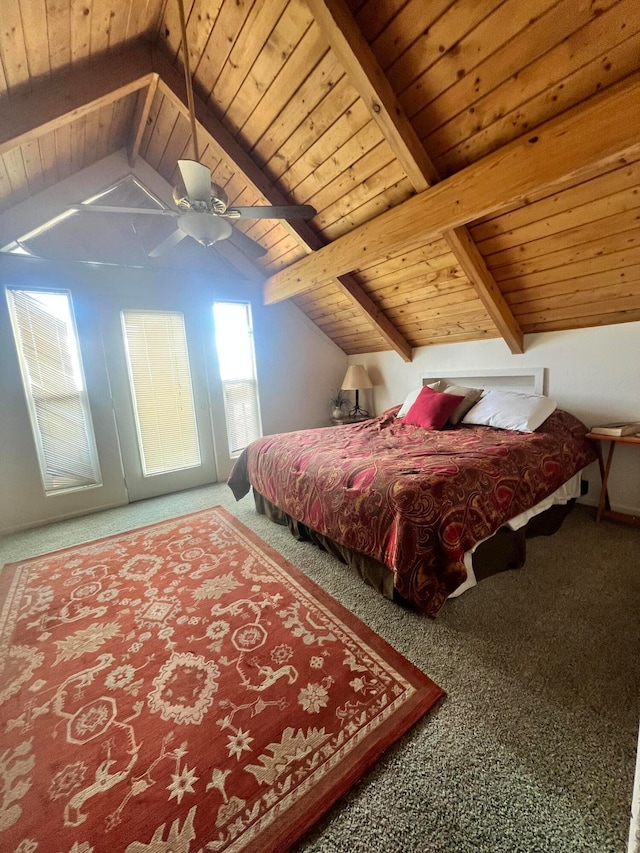 bedroom featuring ceiling fan, carpet flooring, vaulted ceiling with beams, and wooden ceiling