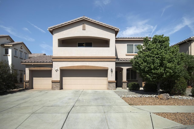 mediterranean / spanish-style home featuring a garage