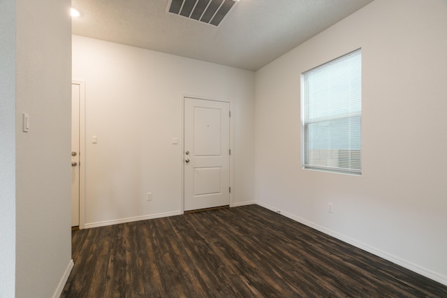 6213 White Hawk Dr NE, Rio Rancho, NM 87144 - spare room with dark wood finished floors and baseboards