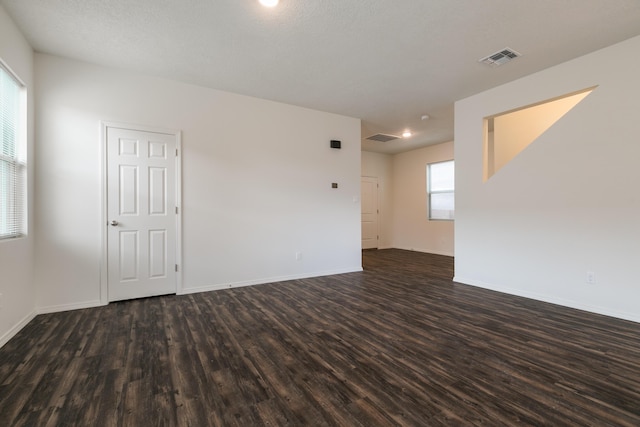 6213 White Hawk Dr NE, Rio Rancho, NM 87144 - empty room featuring dark wood-type flooring and recessed lighting