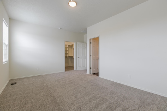 6213 White Hawk Dr NE, Rio Rancho, NM 87144 - carpeted spare room with baseboards