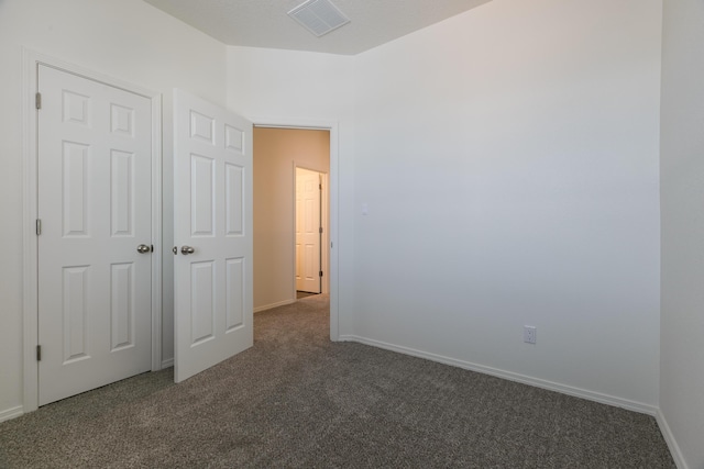 6213 White Hawk Dr NE, Rio Rancho, NM 87144 - unfurnished bedroom featuring carpet floors and baseboards
