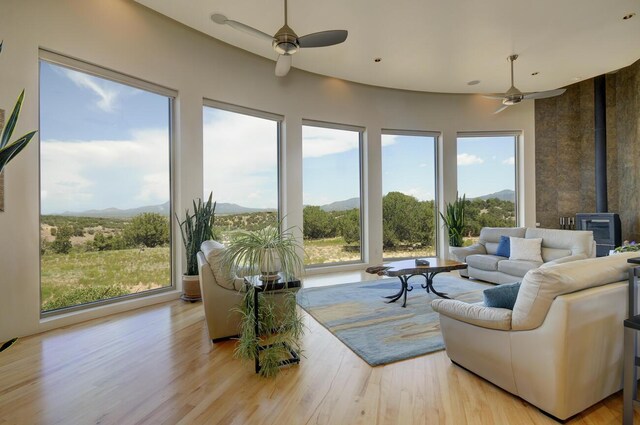 view of front of property featuring a garage and a mountain view