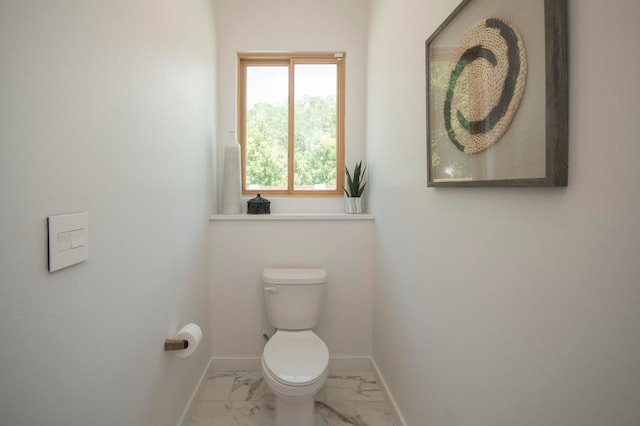 bathroom featuring toilet