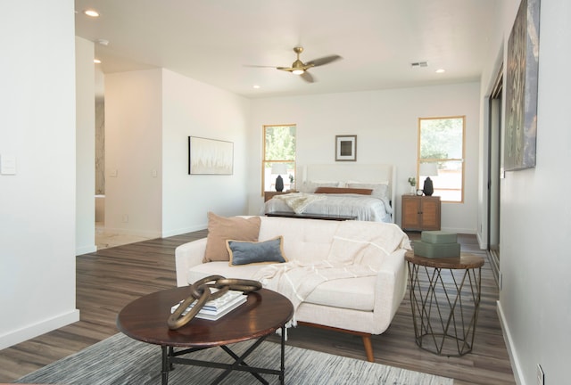 bedroom with dark wood-type flooring and ceiling fan