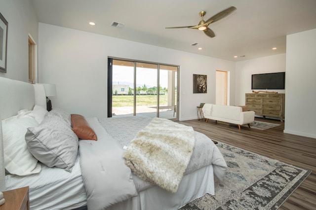 bedroom with access to outside, ceiling fan, and dark hardwood / wood-style flooring