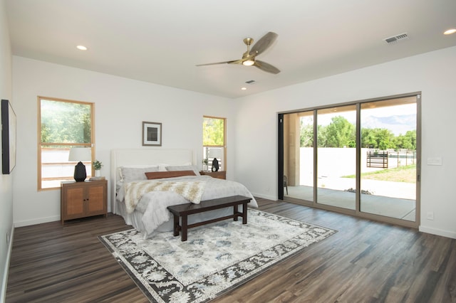 bedroom featuring dark wood-type flooring, ceiling fan, and access to exterior