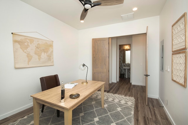 office area featuring dark hardwood / wood-style floors and ceiling fan