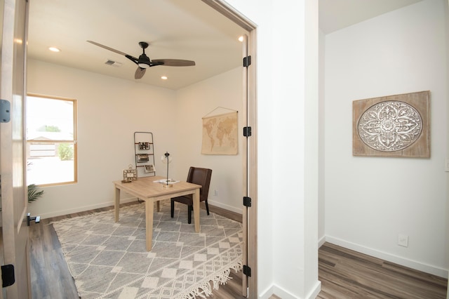 office featuring hardwood / wood-style floors and ceiling fan