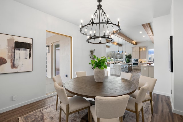 dining area with beam ceiling, dark wood-type flooring, and an inviting chandelier