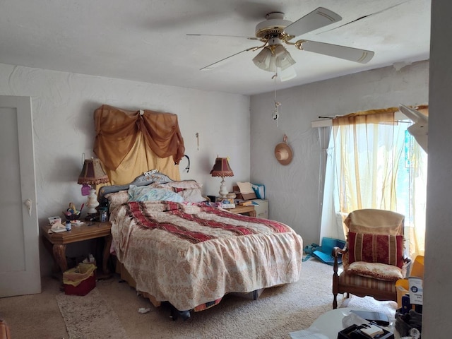 bedroom with carpet flooring and ceiling fan