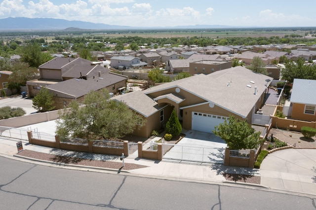 drone / aerial view featuring a mountain view