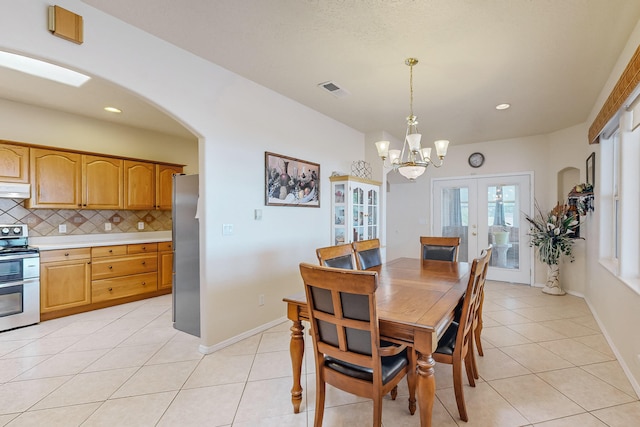 dining room with recessed lighting, french doors, baseboards, and light tile patterned flooring