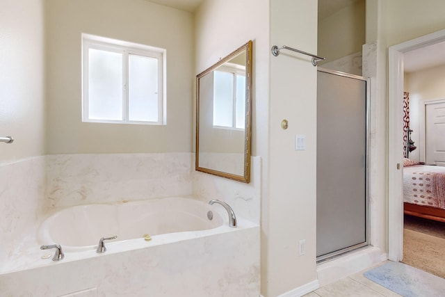 full bath with a garden tub, a stall shower, ensuite bathroom, and tile patterned flooring