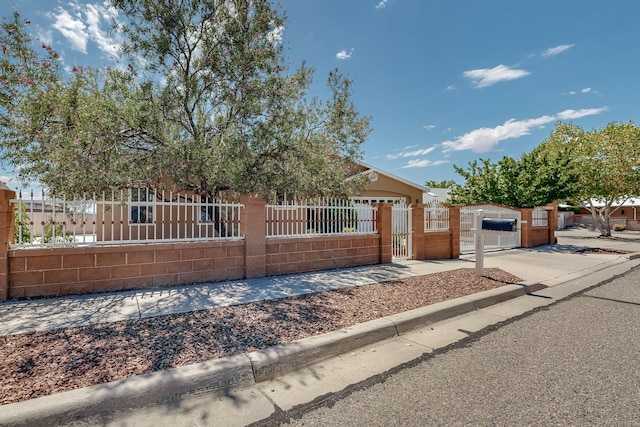 view of front facade with a gate and a fenced front yard