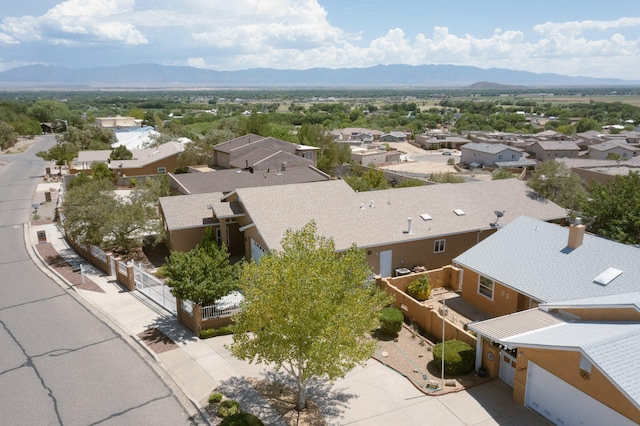 bird's eye view featuring a mountain view and a residential view