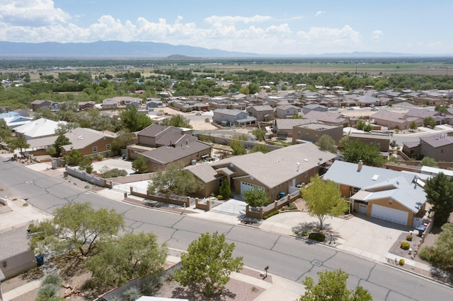 aerial view with a mountain view and a residential view