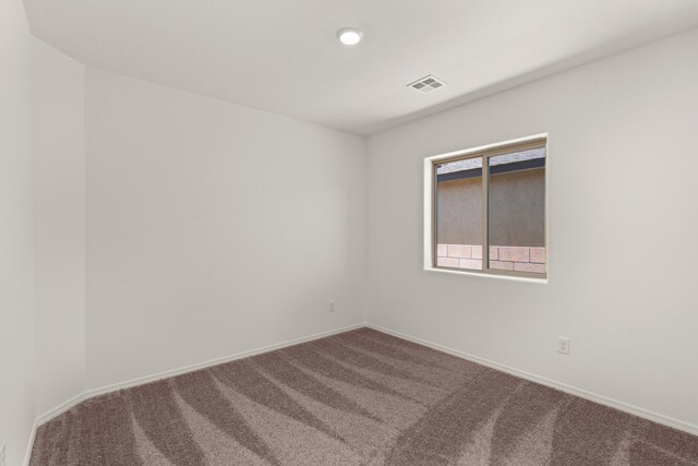 5119 Findley St SW, Los Lunas, NM 87031 - spare room featuring carpet floors