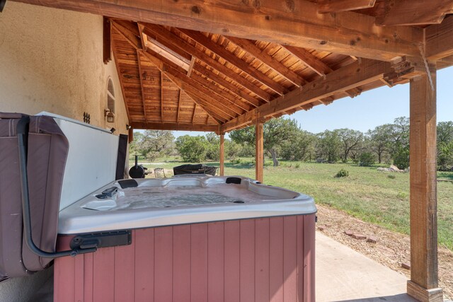 view of patio featuring a hot tub