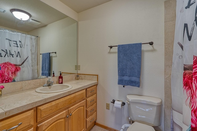 full bathroom with visible vents, a shower with shower curtain, vanity, and toilet