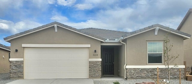 single story home with a tile roof, driveway, stone siding, a garage, and stucco siding