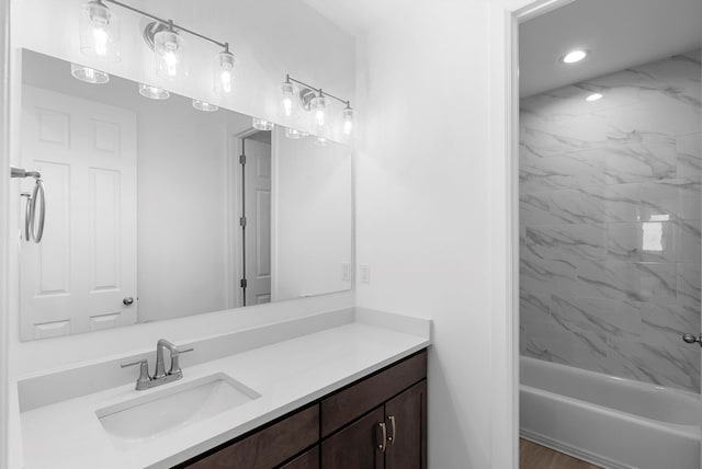 bathroom with shower / bath combination and vanity