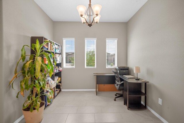 office featuring a notable chandelier and light tile patterned floors