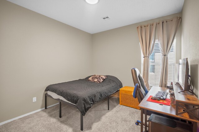 bedroom featuring carpet flooring