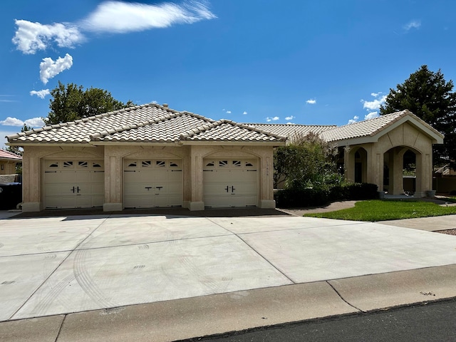 view of front of home with a garage