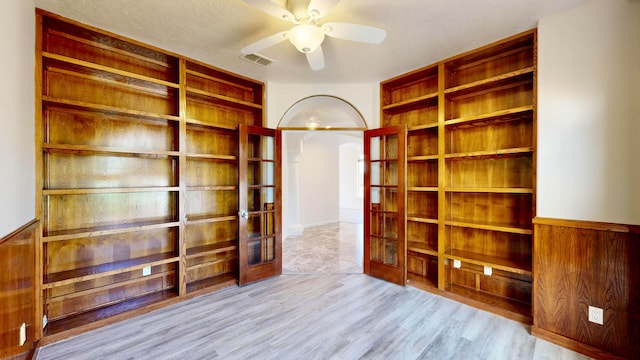 interior space featuring ceiling fan and light hardwood / wood-style flooring