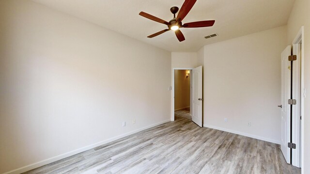 unfurnished bedroom with ceiling fan and light hardwood / wood-style floors