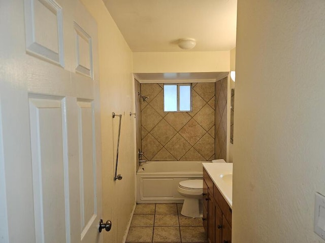 bathroom with tile patterned flooring, toilet, vanity, and shower / tub combination