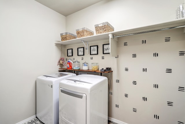 laundry area featuring washing machine and dryer