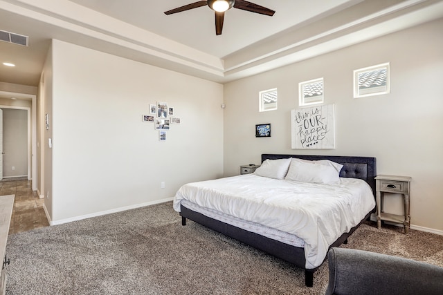 carpeted bedroom with ceiling fan