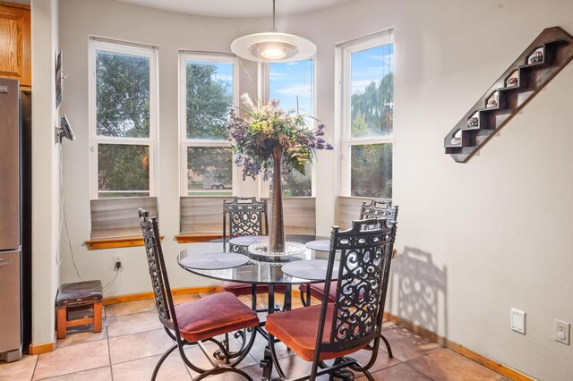 dining room featuring light tile patterned floors