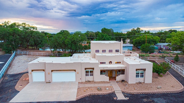 view of front of property featuring a garage