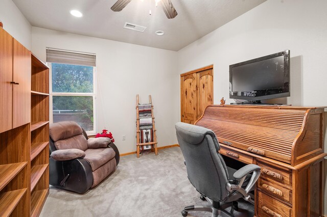 home office with ceiling fan and light colored carpet