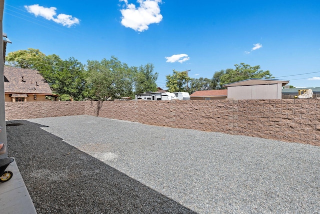 view of yard with a patio area and fence