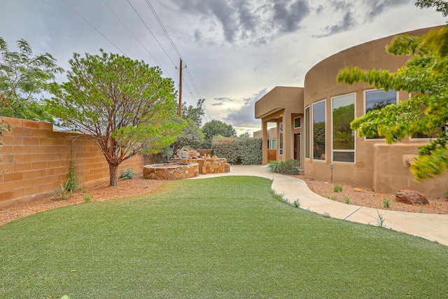 view of yard with a fenced backyard