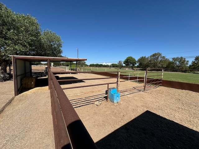 57 Edmundo Rd, Belen, NM 87002 - view of property's community featuring an outdoor structure and a rural view