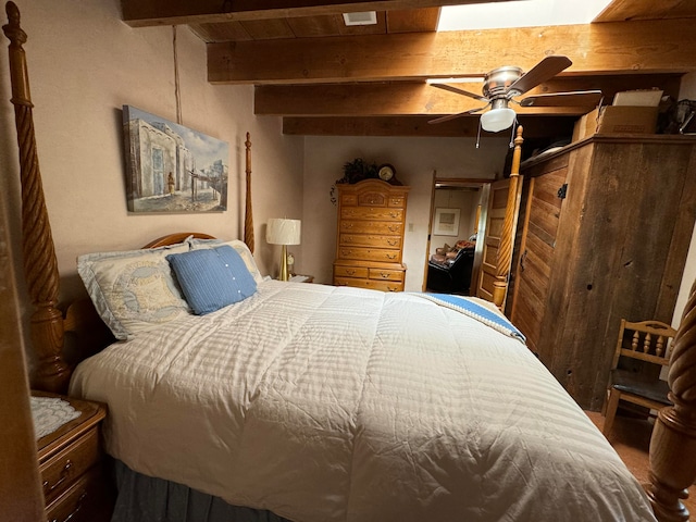 57 Edmundo Rd, Belen, NM 87002 - bedroom featuring ceiling fan and beamed ceiling