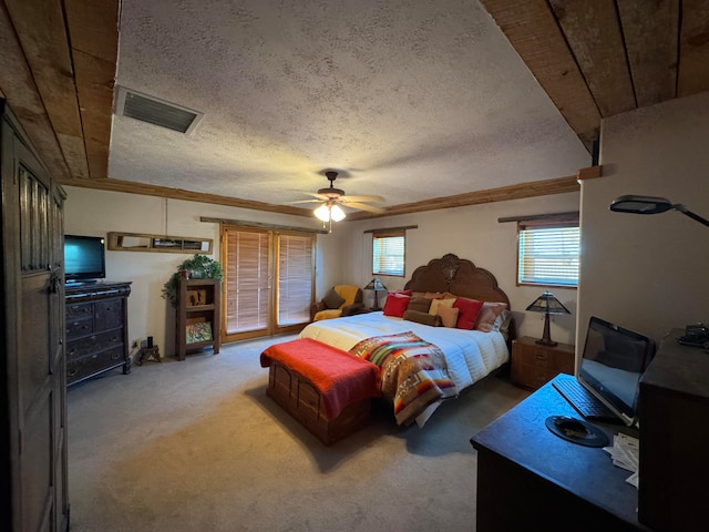 57 Edmundo Rd, Belen, NM 87002 - carpeted bedroom featuring ornamental molding, a textured ceiling, access to exterior, and ceiling fan