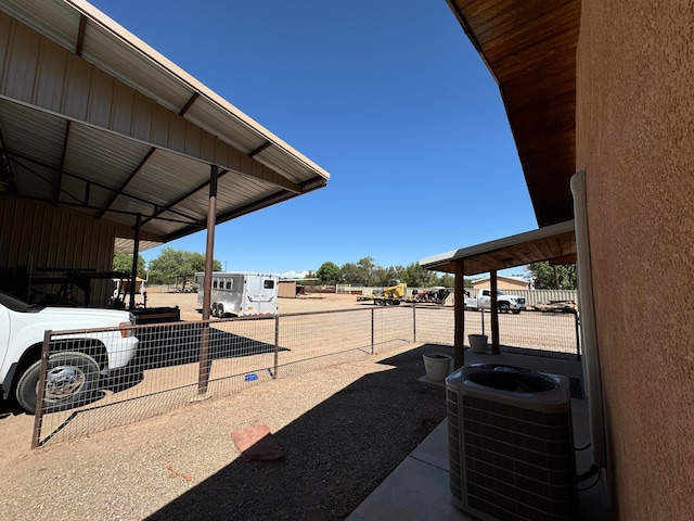 57 Edmundo Rd, Belen, NM 87002 - view of yard featuring central AC unit