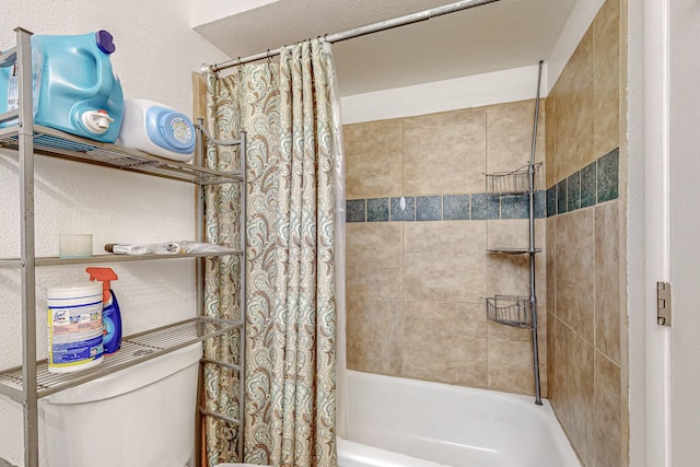 bathroom featuring toilet and shower / bathtub combination with curtain