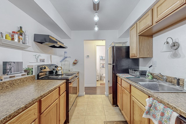 kitchen featuring light tile patterned floors, black appliances, light brown cabinetry, sink, and extractor fan