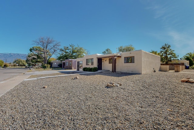 southwest-style home with a mountain view