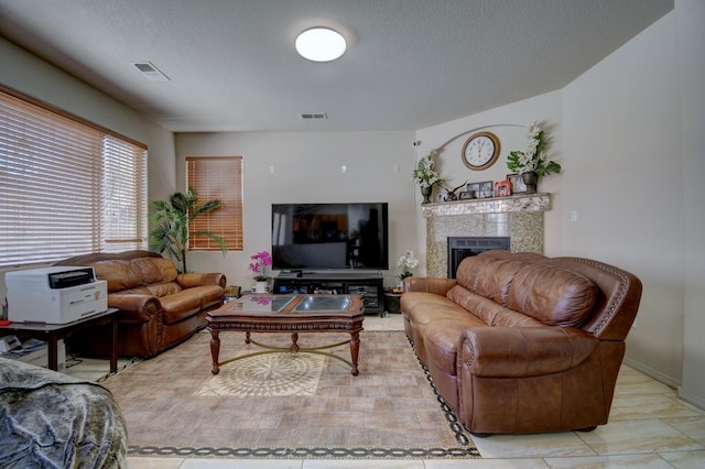 living room with a textured ceiling